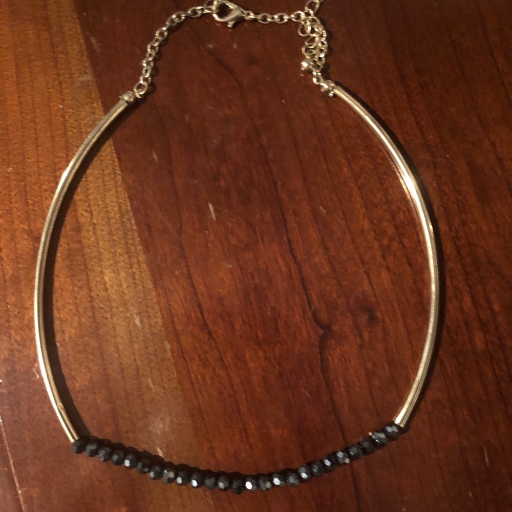 Cute gold/ black choker necklace. Adjustable !